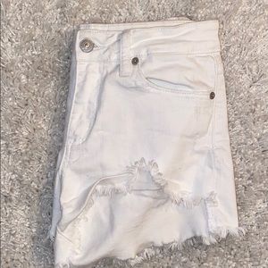 distressed white shorts